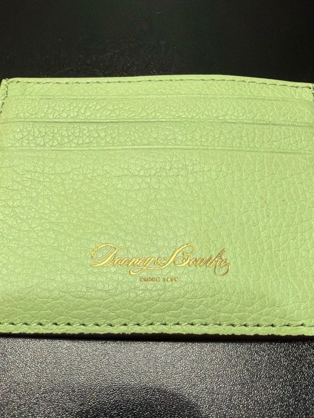 Dooney & Bourke Light Green Pebbled Leather Card Holder with Gold Logo